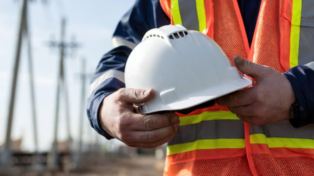 Worker wearing a safety helmet on a construction site